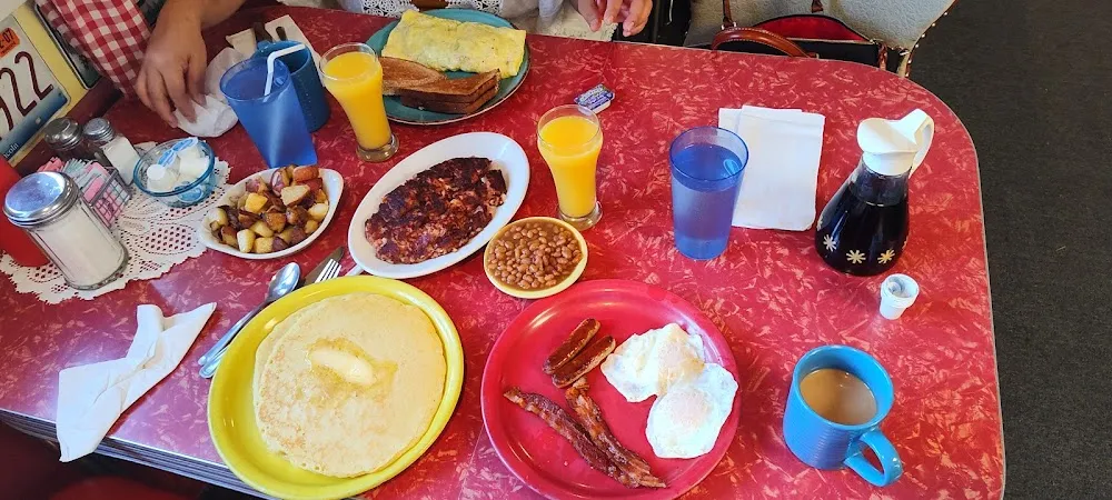 Eggs Bacon Sausage Home Fries Baked Beans Grits